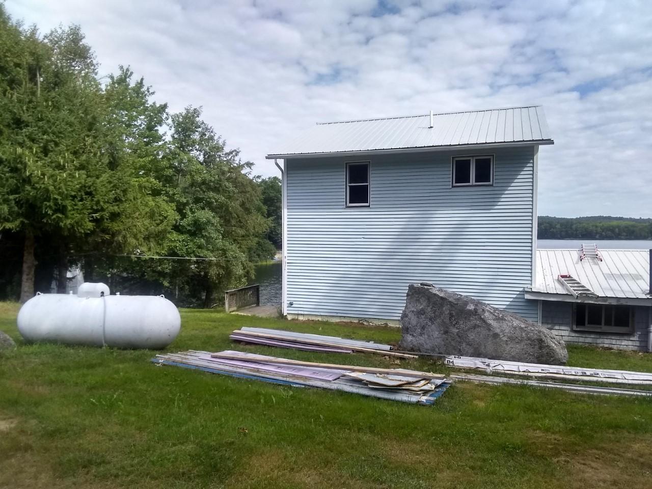 851 Federal Road Livermore, ME 04253 - Photo 19 of 47 0336 rear of blue big rock and propane t