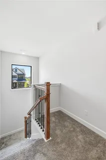 a view of hallway with stairs