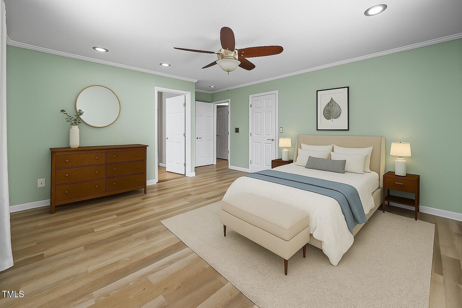 5561 Roan Mountain Place Raleigh, NC 27613 - Photo 9 of 20 a spacious bedroom with a bed and window