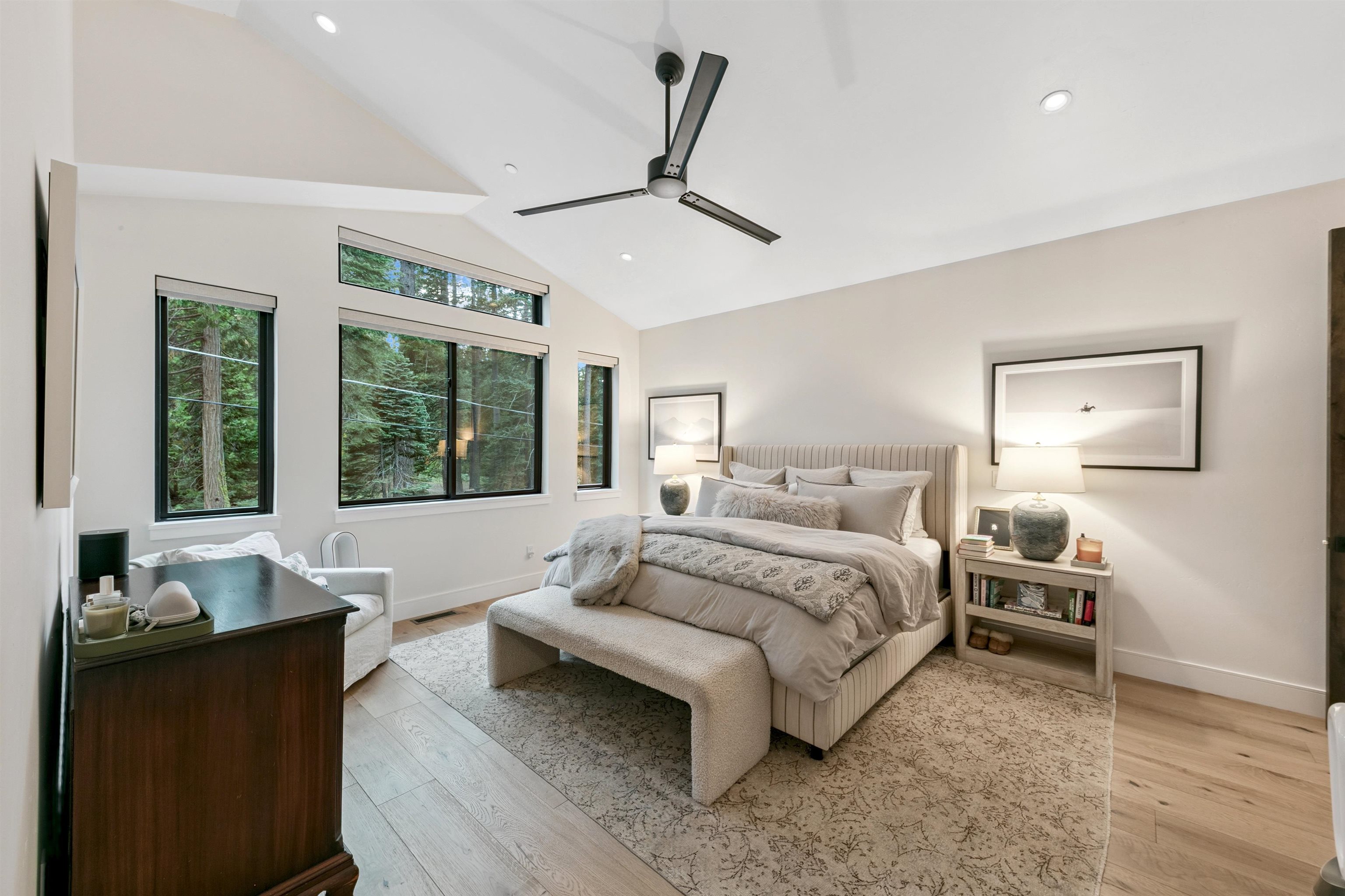 7247 9th Avenue Tahoma, CA 96142 - Photo 18 of 28 a spacious bedroom with a bed and a large window