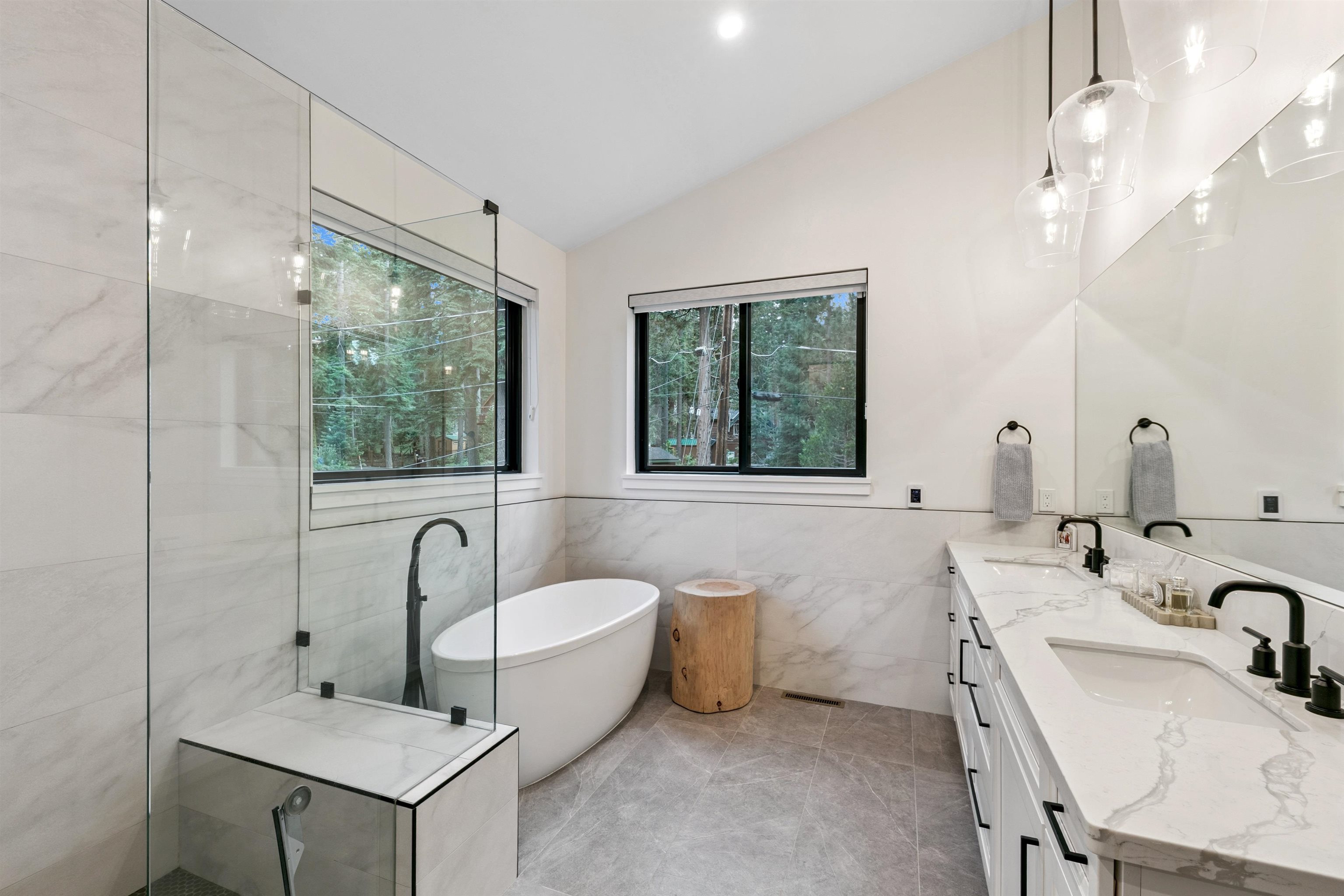7247 9th Avenue Tahoma, CA 96142 - Photo 19 of 28 a bathroom with a tub sink and mirror