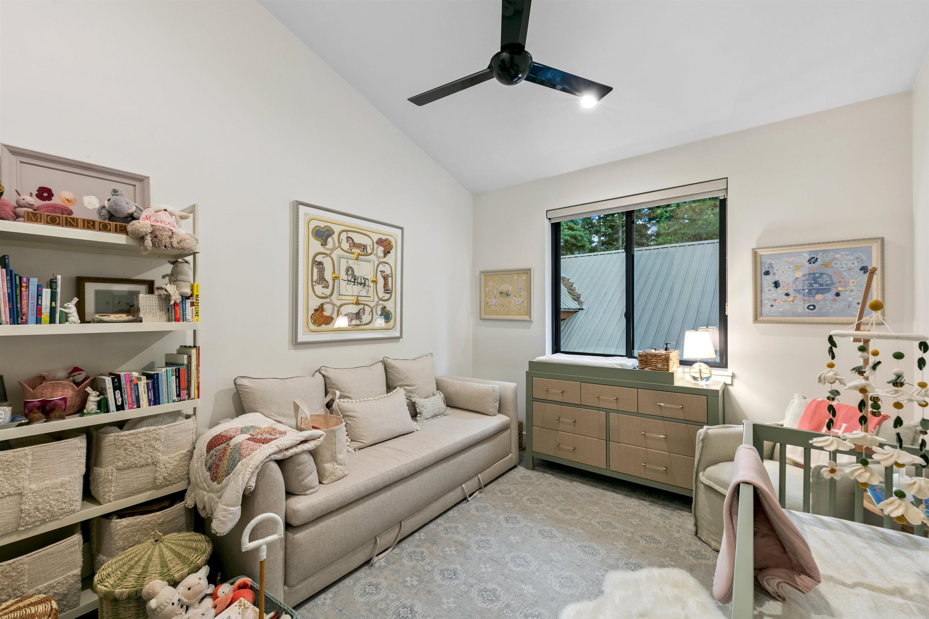 7247 9th Avenue Tahoma, CA 96142 - Photo 20 of 28 a living room with furniture and a book shelf