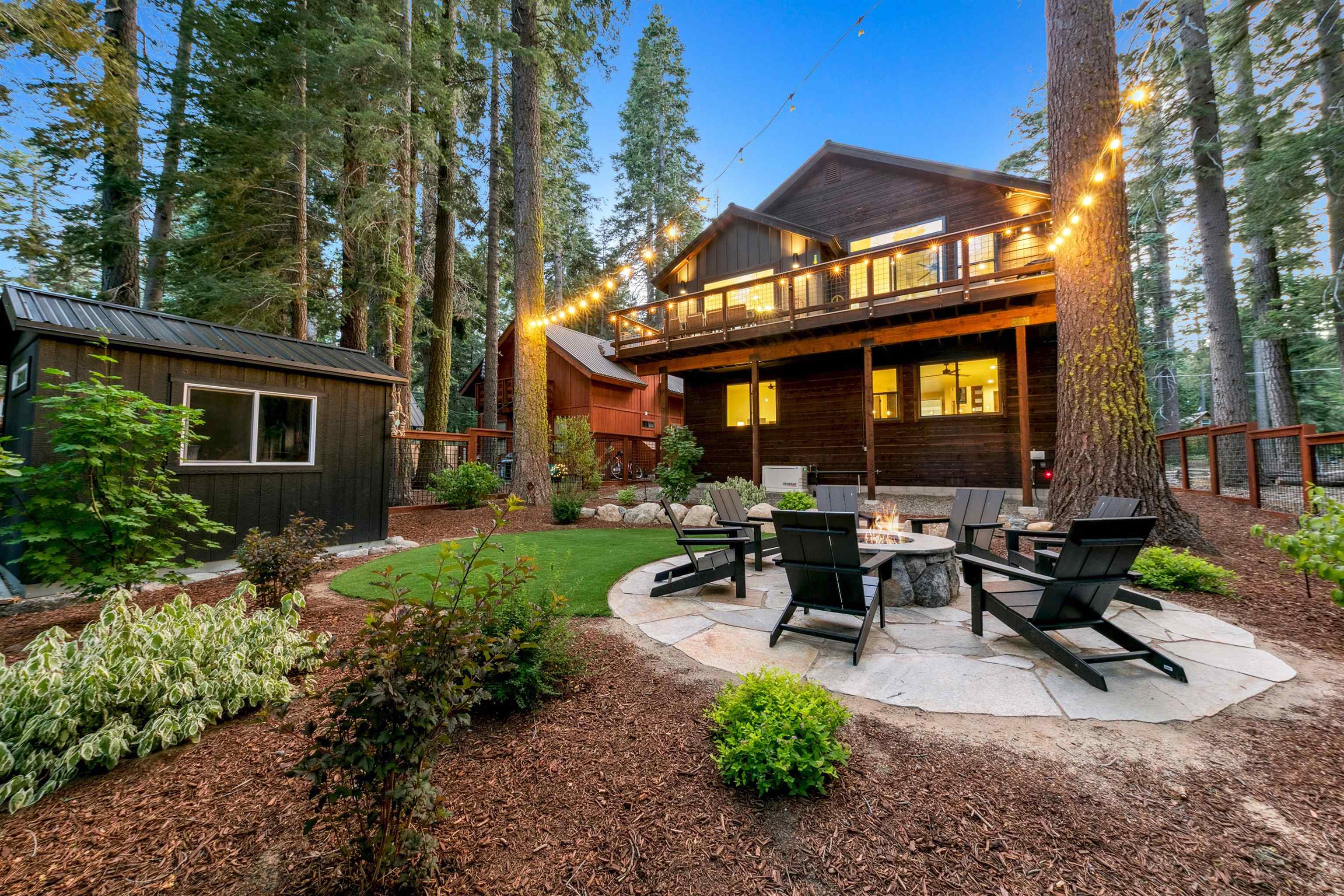 7247 9th Avenue Tahoma, CA 96142 - Photo 2 of 28 a view of a patio with couches table and chairs and potted plants