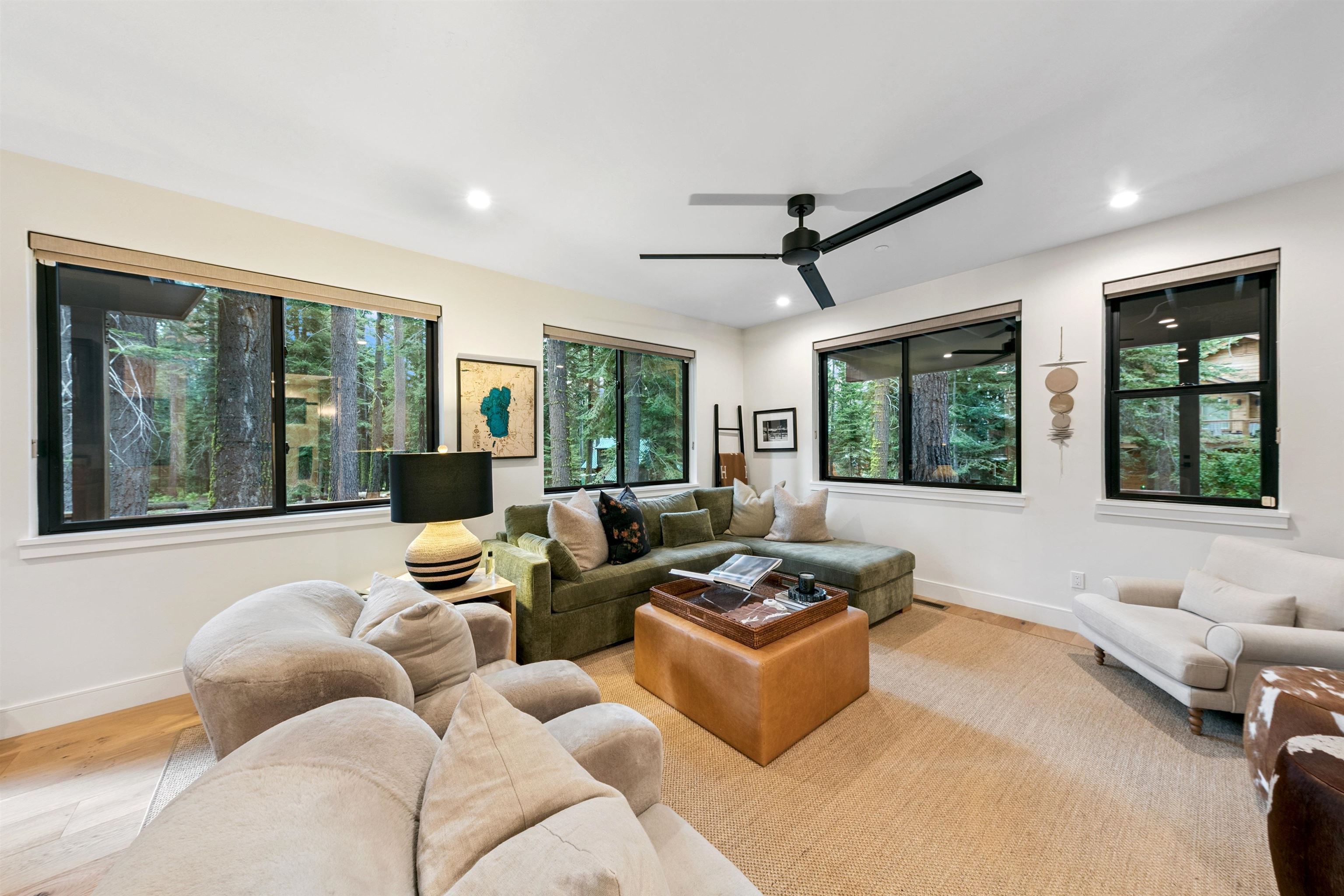 7247 9th Avenue Tahoma, CA 96142 - Photo 22 of 28 a living room with furniture and a large window