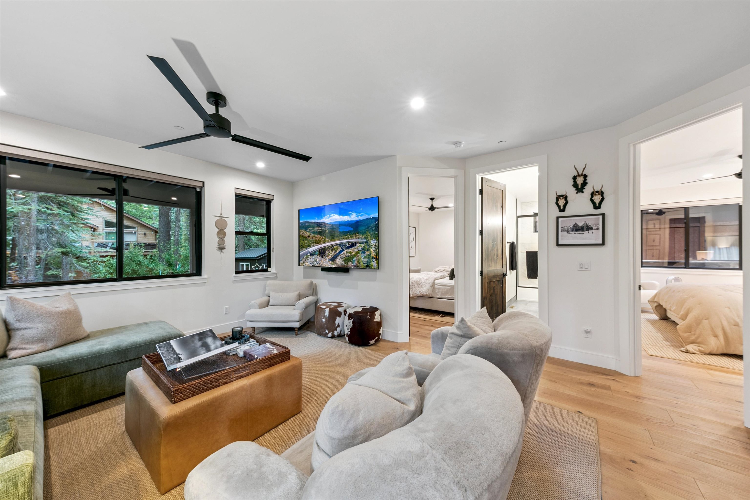 7247 9th Avenue Tahoma, CA 96142 - Photo 24 of 28 a living room with furniture and a large window