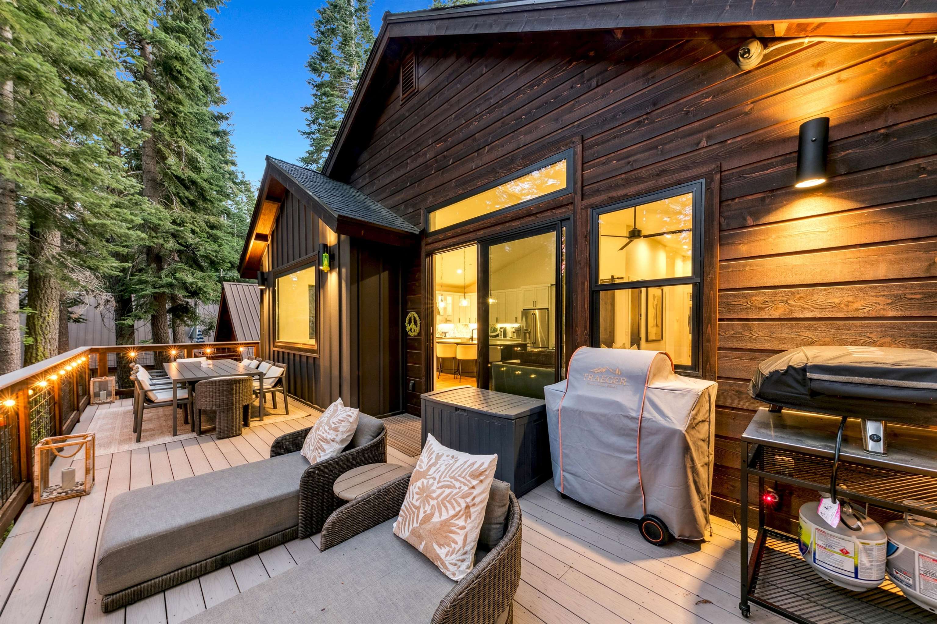 7247 9th Avenue Tahoma, CA 96142 - Photo 4 of 28 a outdoor living space with furniture and a fireplace