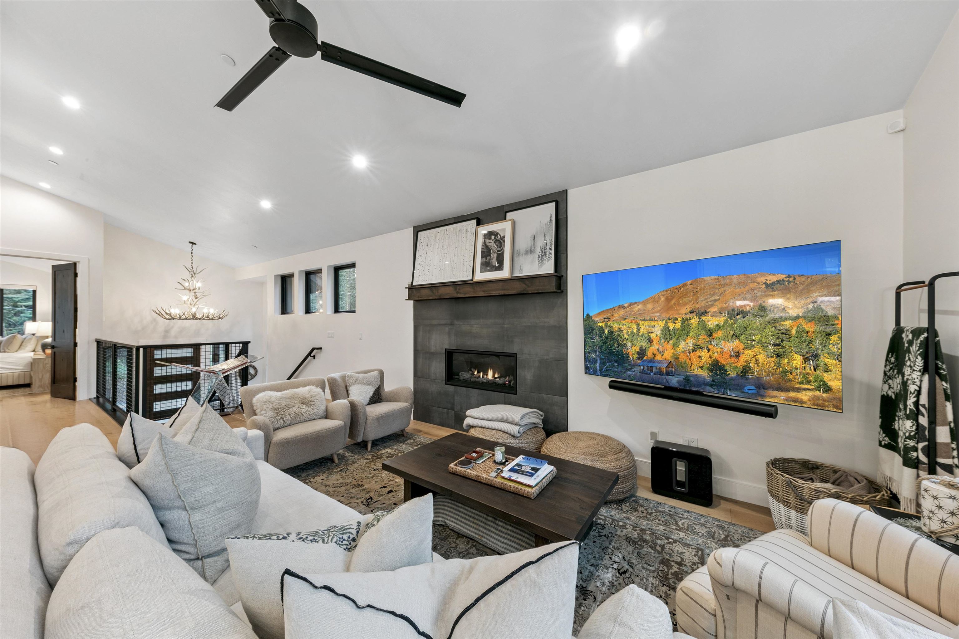 7247 9th Avenue Tahoma, CA 96142 - Photo 8 of 28 a living room with furniture and a flat screen tv