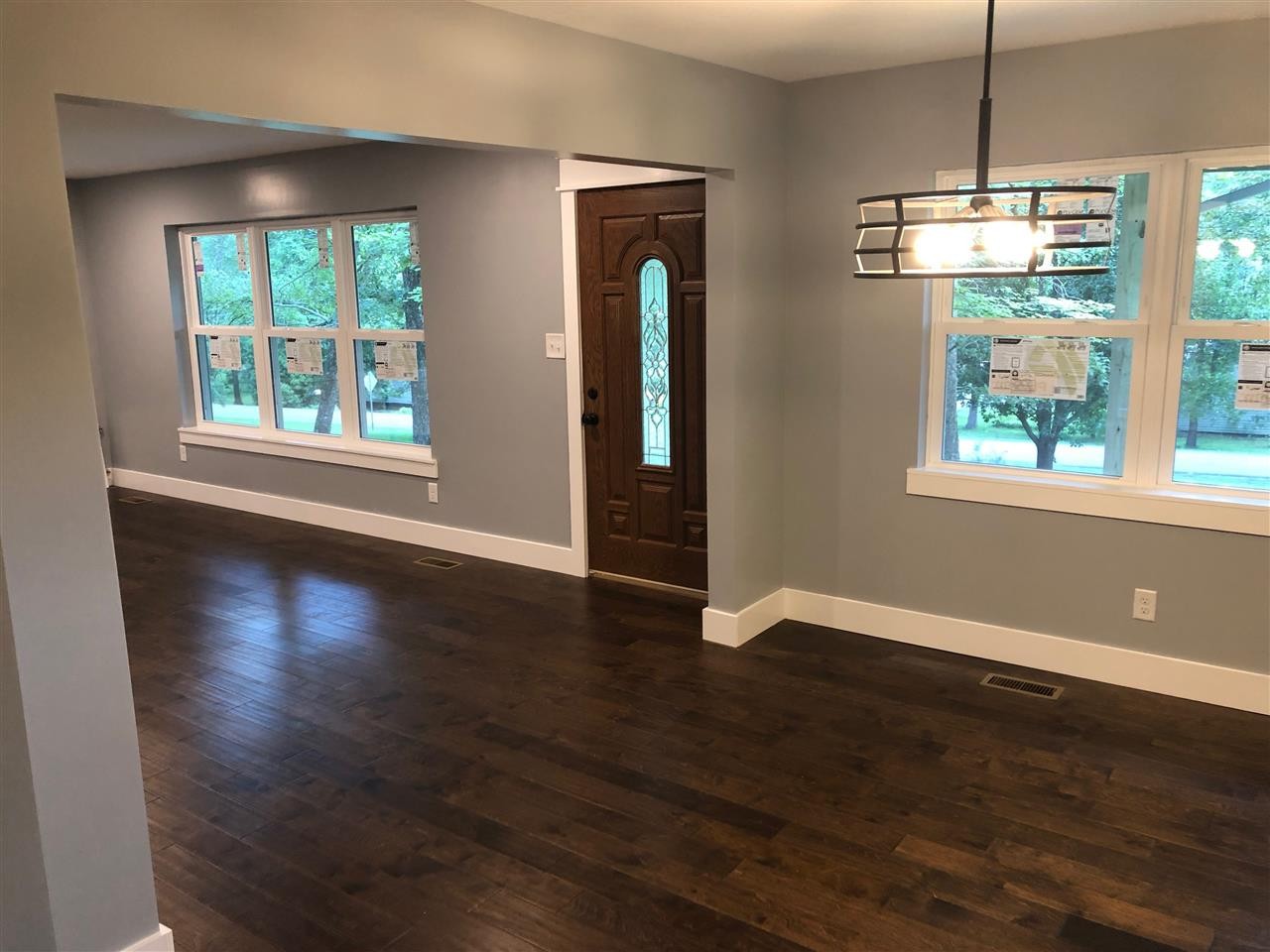 361 Green Shadow Road Cleveland, TN 37323 - Photo 5 of 33 an empty room with wooden floor and windows