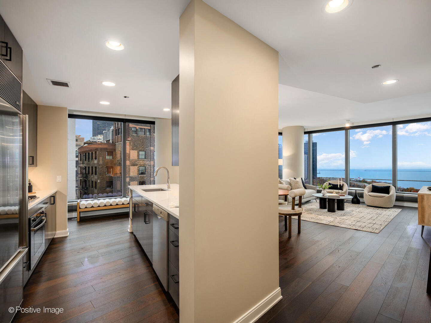 60 East Monroe Street, Unit 2001 Chicago, IL 60603 - Photo 13 of 68 a view of a living room and dining room with furniture window