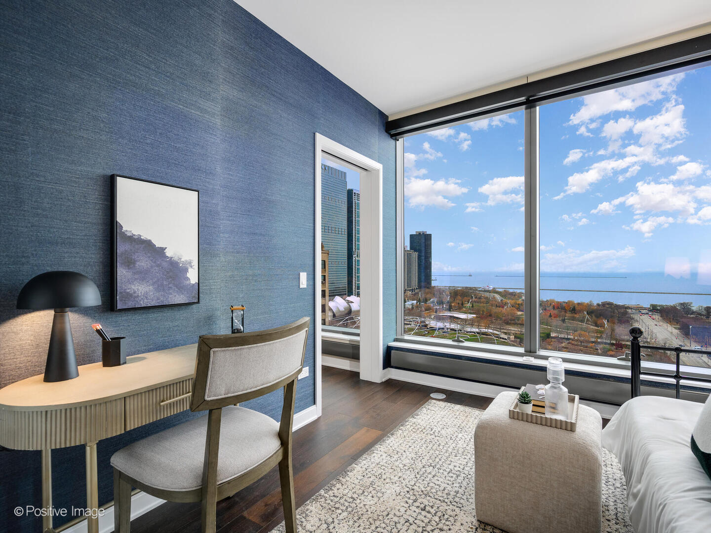 60 East Monroe Street, Unit 2001 Chicago, IL 60603 - Photo 16 of 68 a bedroom with furniture and a large window