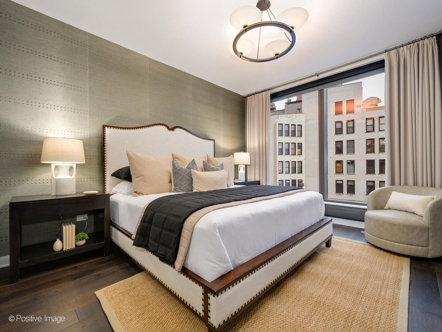 60 East Monroe Street, Unit 2001 Chicago, IL 60603 - Photo 23 of 68 a bed room with a bed and a couch