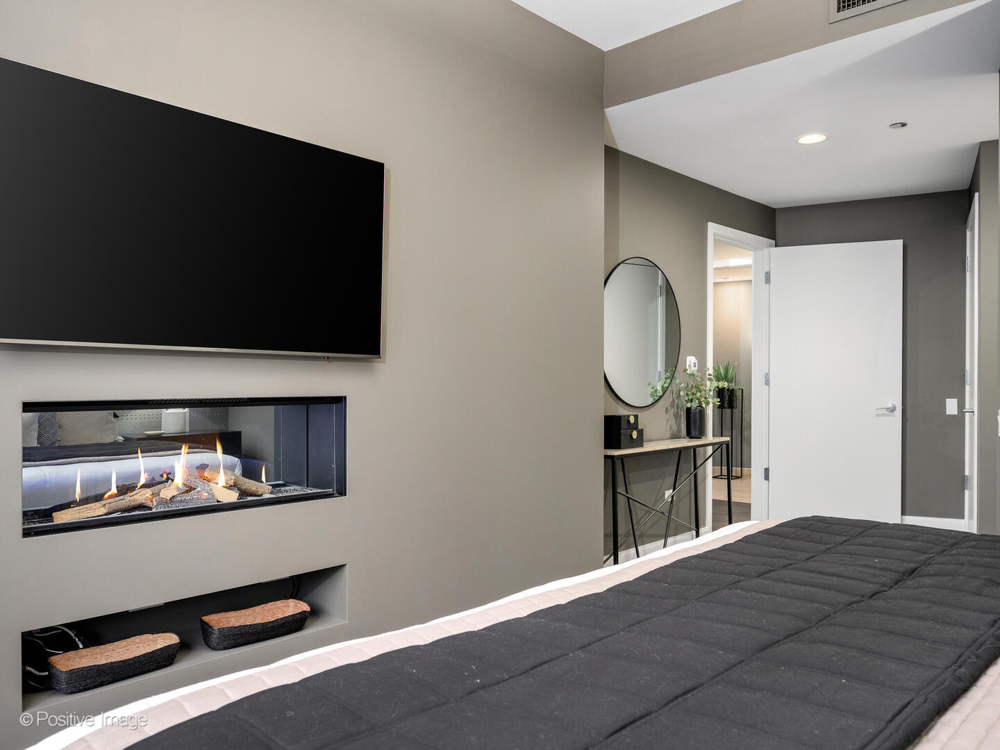 60 East Monroe Street, Unit 2001 Chicago, IL 60603 - Photo 24 of 68 a living room with furniture and a flat screen tv