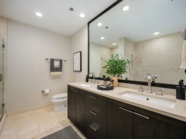 a bathroom with a sink and a shower