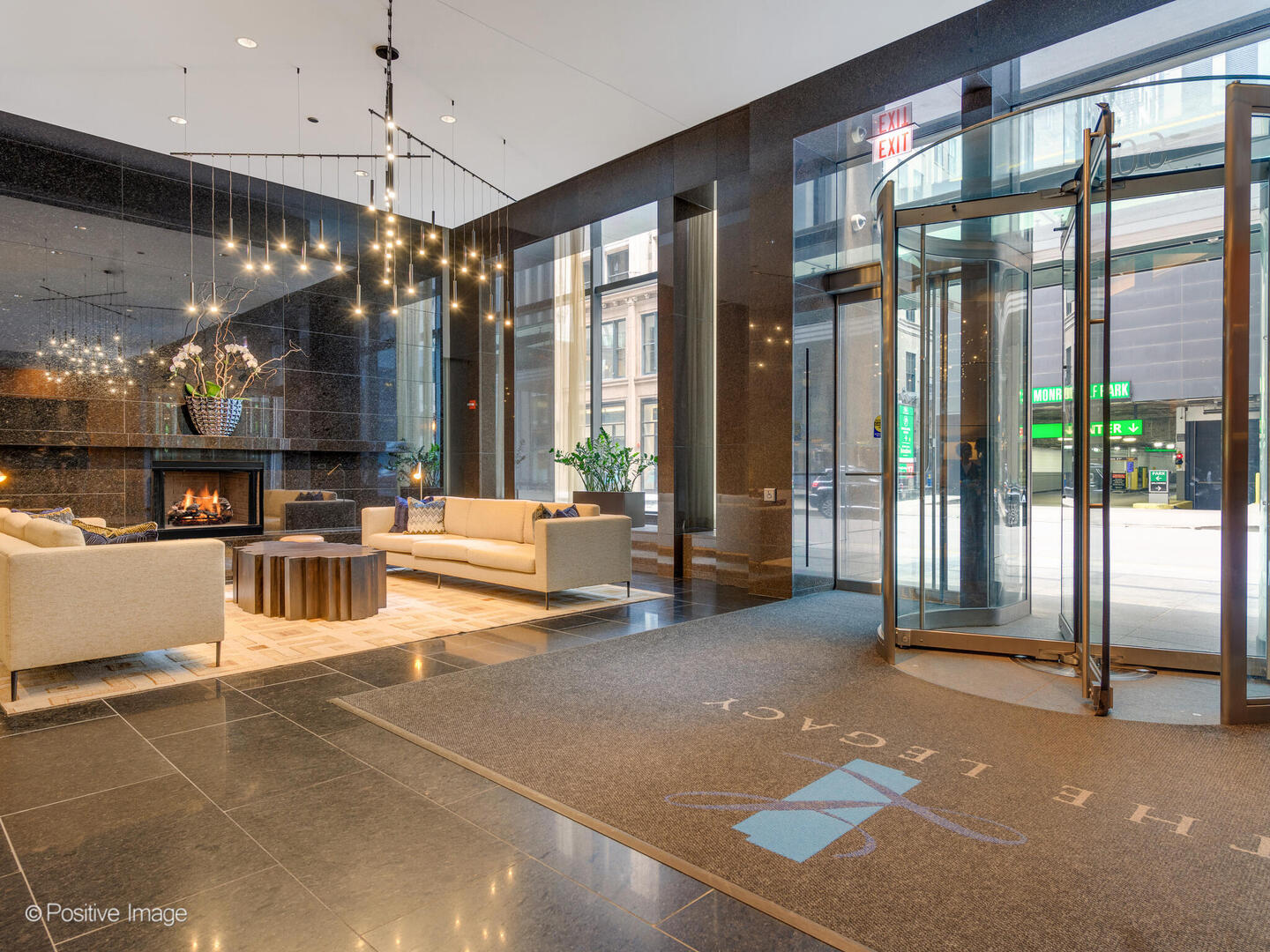 60 East Monroe Street, Unit 2001 Chicago, IL 60603 - Photo 3 of 68 a lobby with furniture and window