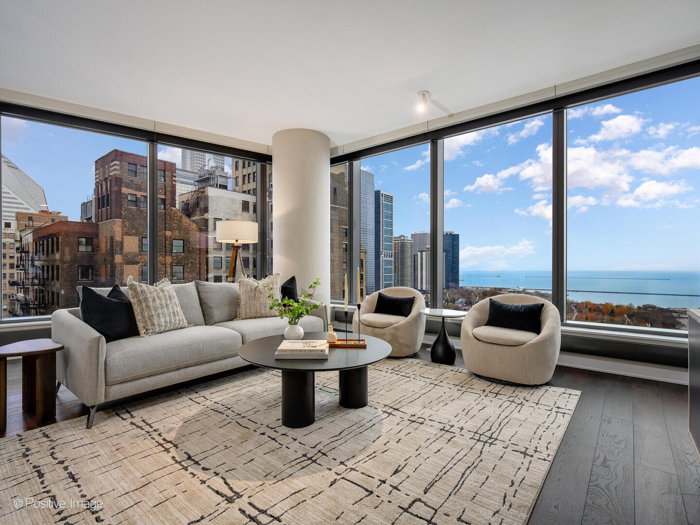 60 East Monroe Street, Unit 2001 Chicago, IL 60603 - Photo 4 of 68 a living room with furniture and floor to ceiling window