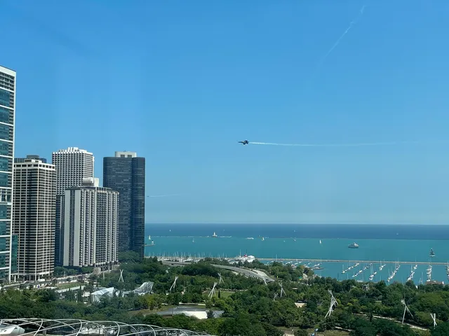 a view of a patio with couches and a fire pit