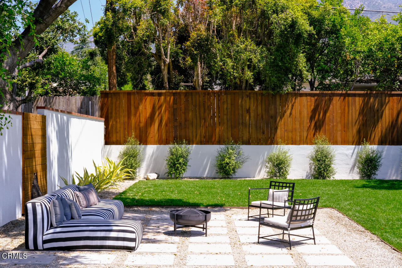 1649 New York Drive Altadena, CA 91001 - Photo 20 of 29 a view of a chair and table in the garden