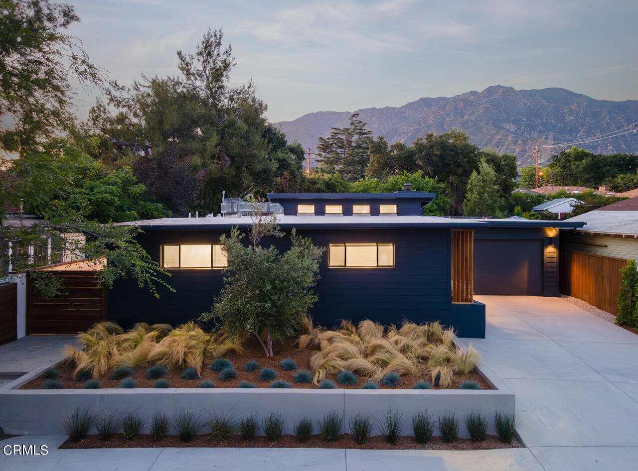 1649 New York Drive Altadena, CA 91001 - Photo 2 of 29 a view of a house with a yard and a wooden fence