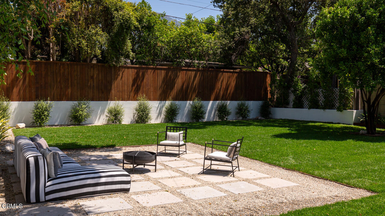 1649 New York Drive Altadena, CA 91001 - Photo 21 of 29 a view of backyard with sitting area and a slide