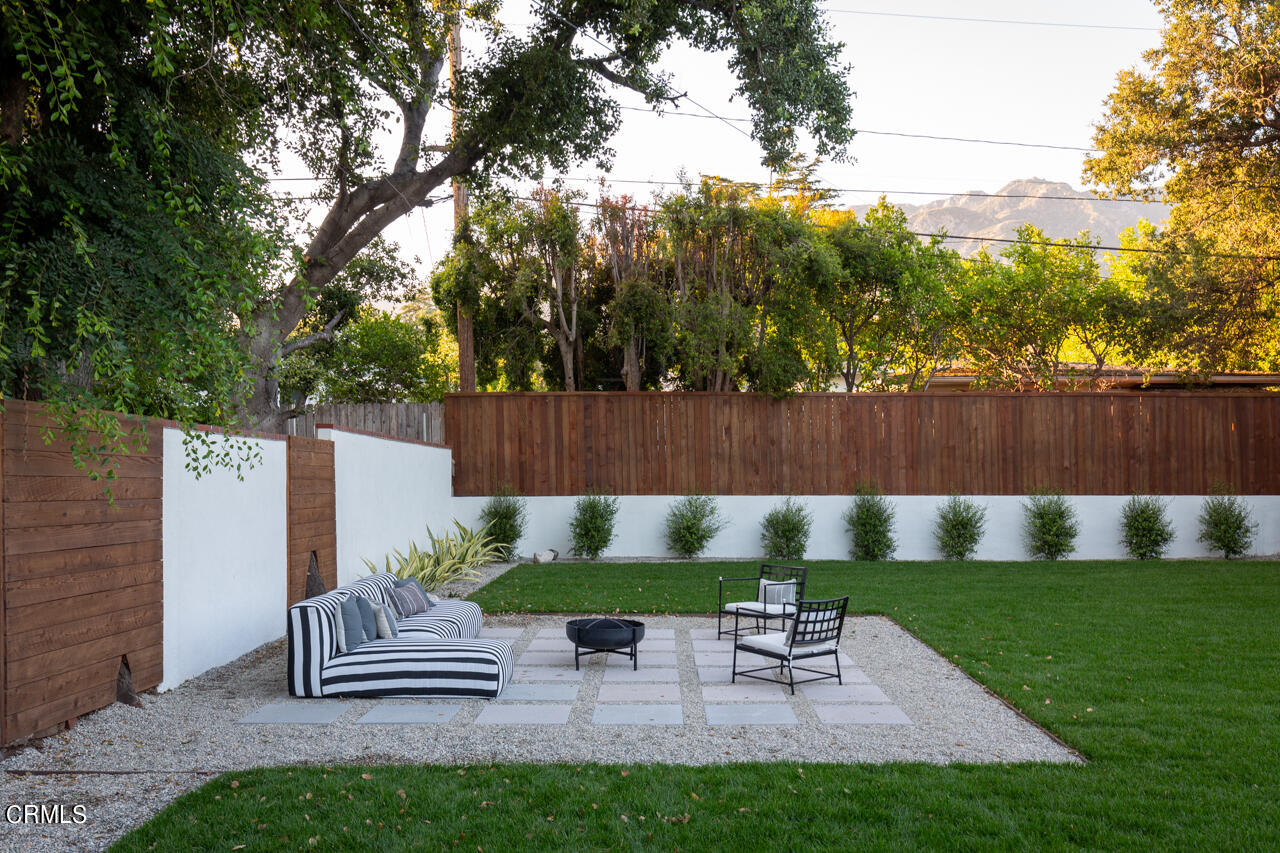 1649 New York Drive Altadena, CA 91001 - Photo 27 of 29 a view of table and chairs in the garden