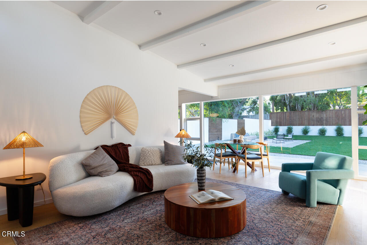 1649 New York Drive Altadena, CA 91001 - Photo 9 of 29 a living room with patio furniture and a large window