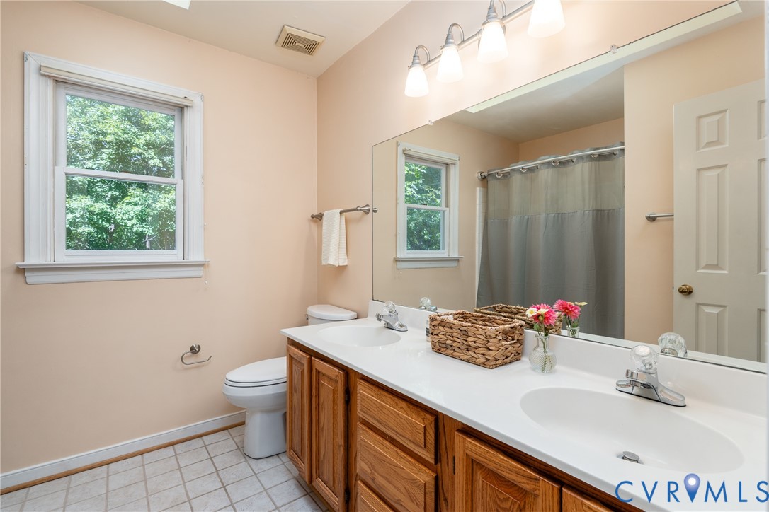 4418 Croatan Road Richmond, VA 23235 - Photo 36 of 50 Upstairs full hall bathroom
