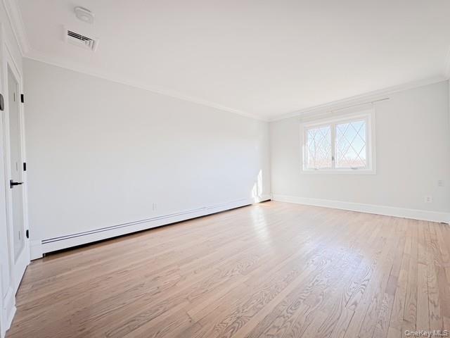 250 Maloney Road Wappingers Falls, NY 12590 - Photo 12 of 24 an empty room with wooden floor and windows