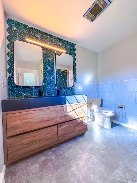 250 Maloney Road Wappingers Falls, NY 12590 - Photo 14 of 24 a living room with furniture and a lamp