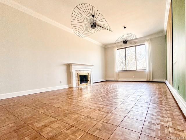 250 Maloney Road Wappingers Falls, NY 12590 - Photo 6 of 24 a view of empty room with wooden floor and fan
