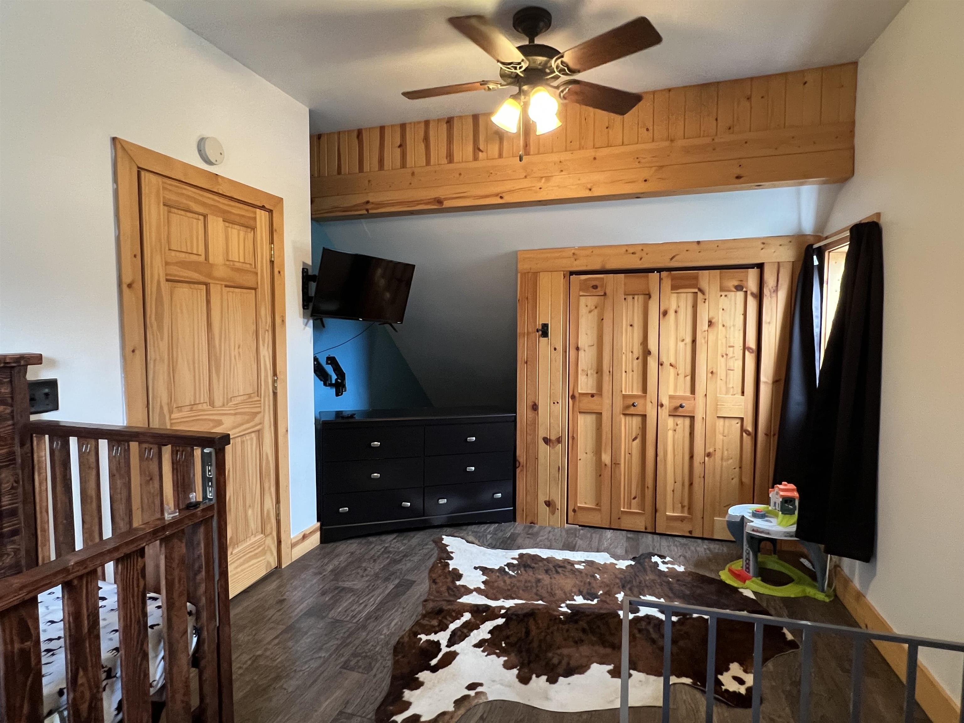 616 Cranston Road Beloit, WI 53511 - Photo 13 of 21 a bedroom with furniture and a window