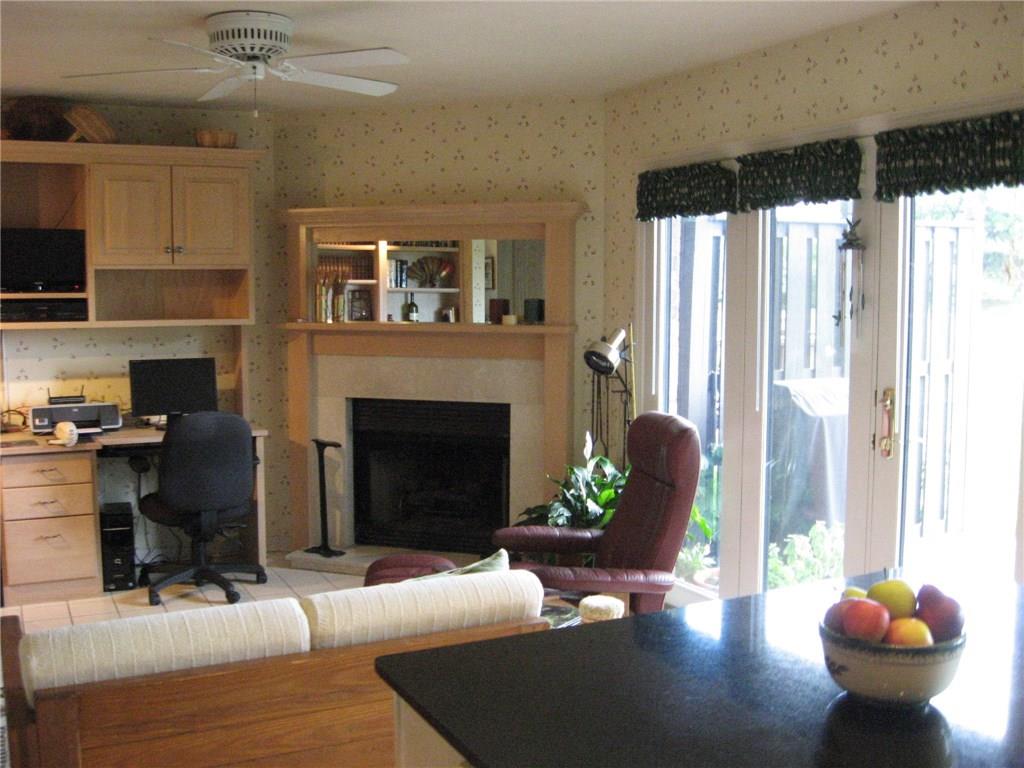 165 Shadow Ridge Drive Pittsburgh, PA 15238 - Photo 6 of 22 FAMILY ROOM/KITCHEN, GREAT ROOM EFFECT - OPENS TO DECK AND VERY LARGE GREEN AREA-MIRROR OVER MARBLE FIREPLACE
