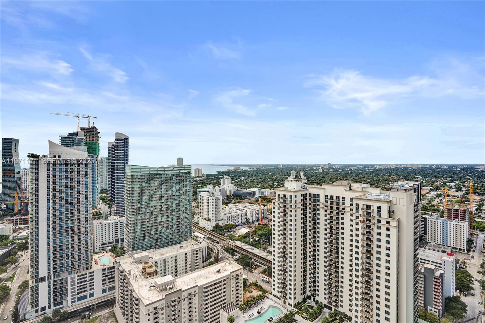 45 Southwest 9th Street, Unit 4004 Miami, FL 33130 - Photo 21 of 28 a view of city with balcony