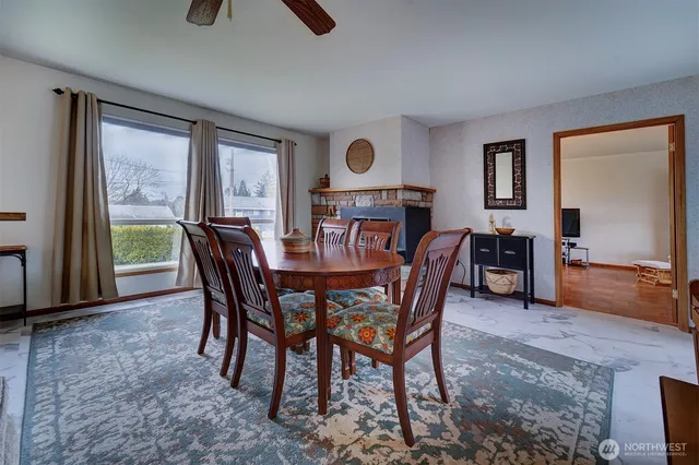a view of a dining room with furniture window and outside view