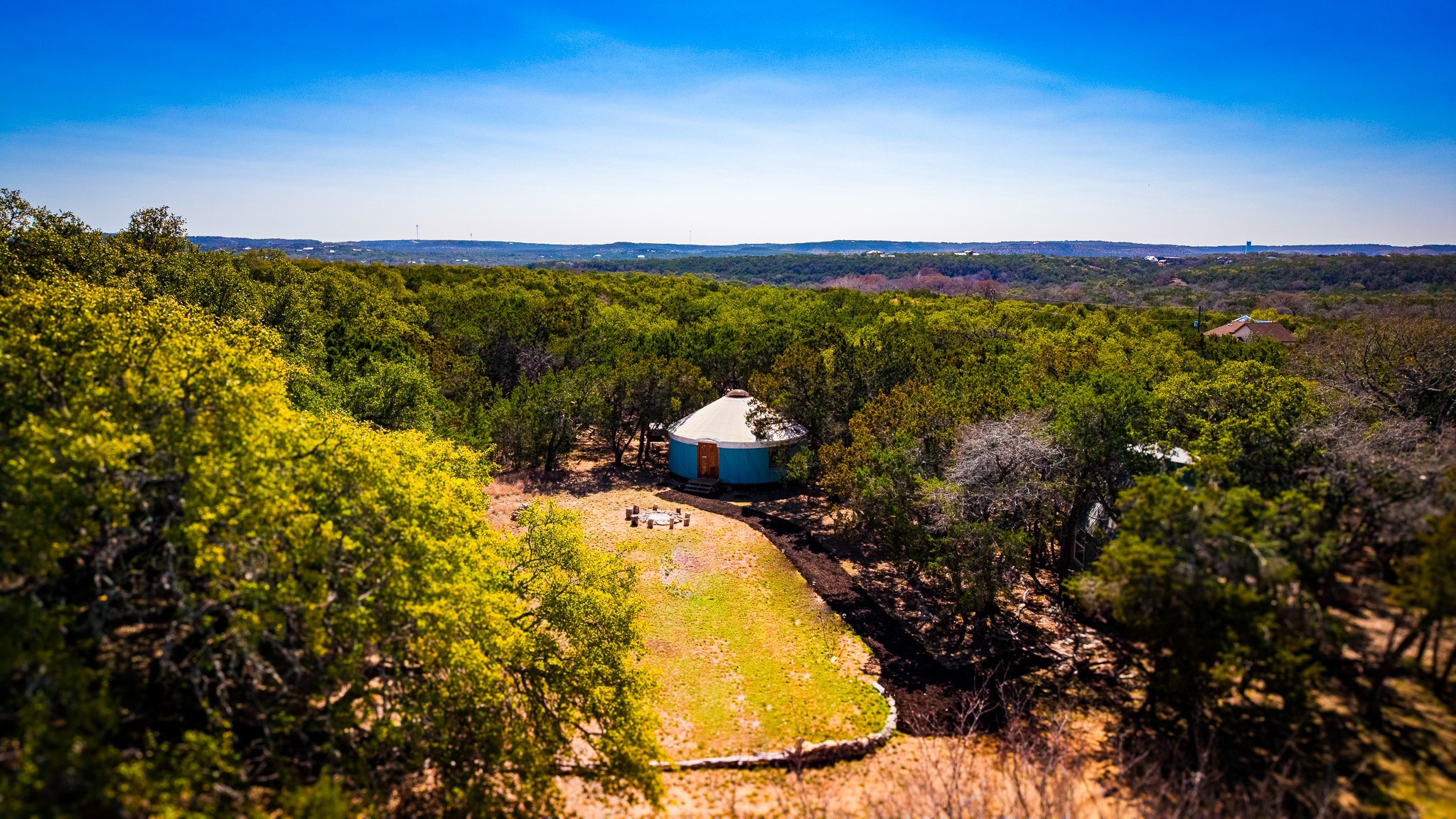 321 Lea Lane Wimberley, TX 78676 - Photo 22 of 39 View of subject property with a forest