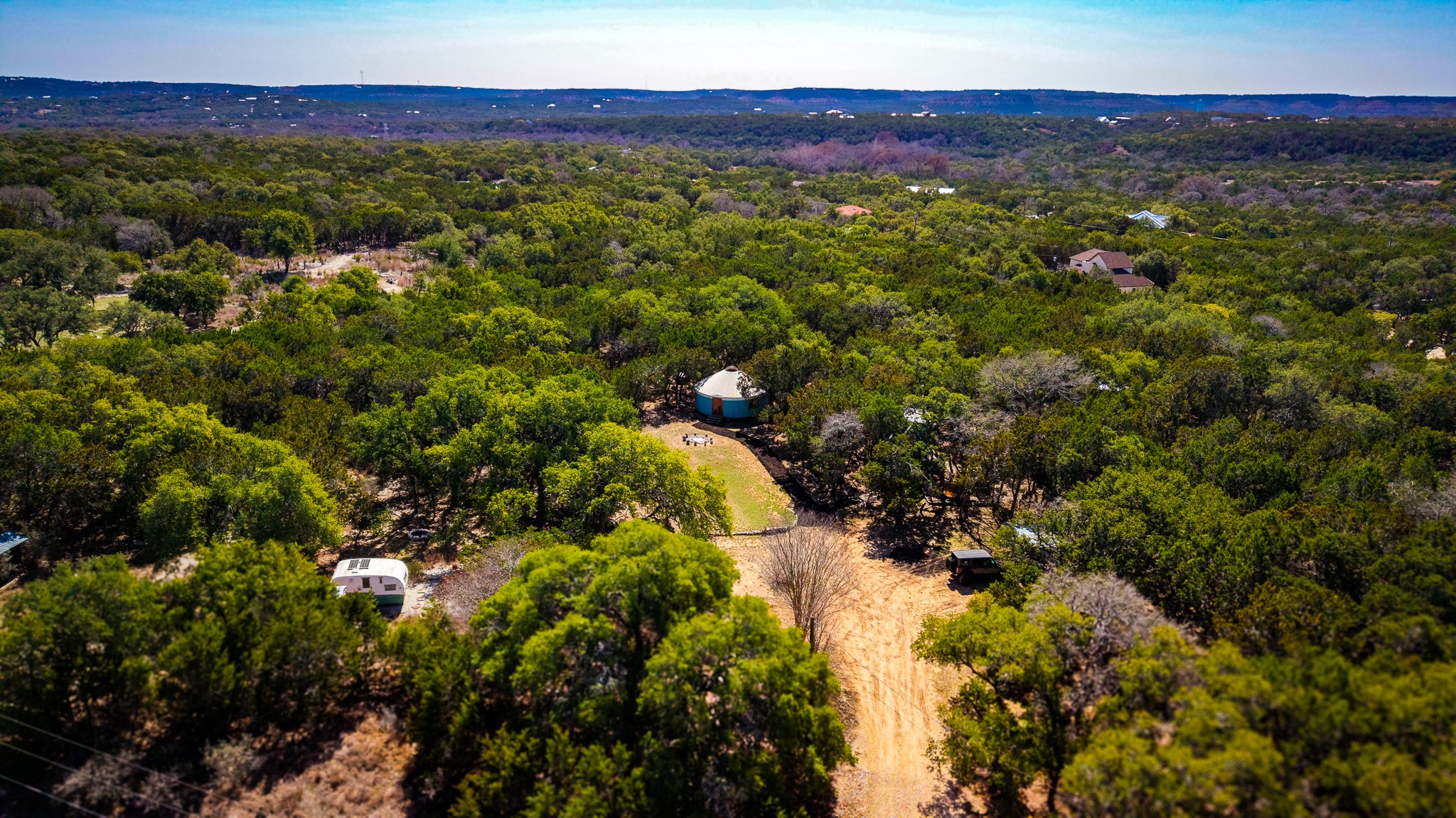 321 Lea Lane Wimberley, TX 78676 - Photo 33 of 39 Drone / aerial view of a forest