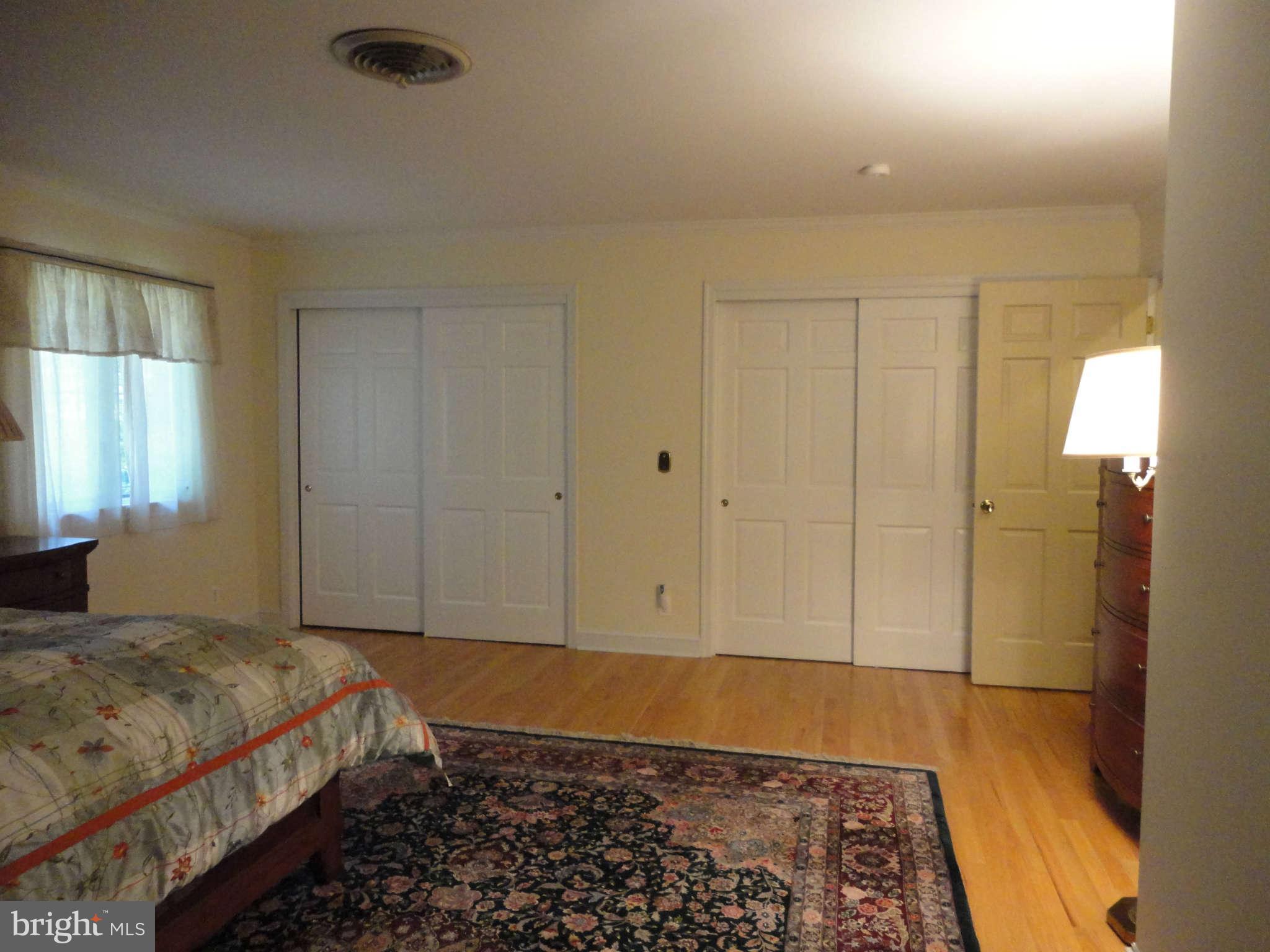 12915 Gent Road Reisterstown, MD 21136 - Photo 17 of 29 a bedroom with a bed and a window