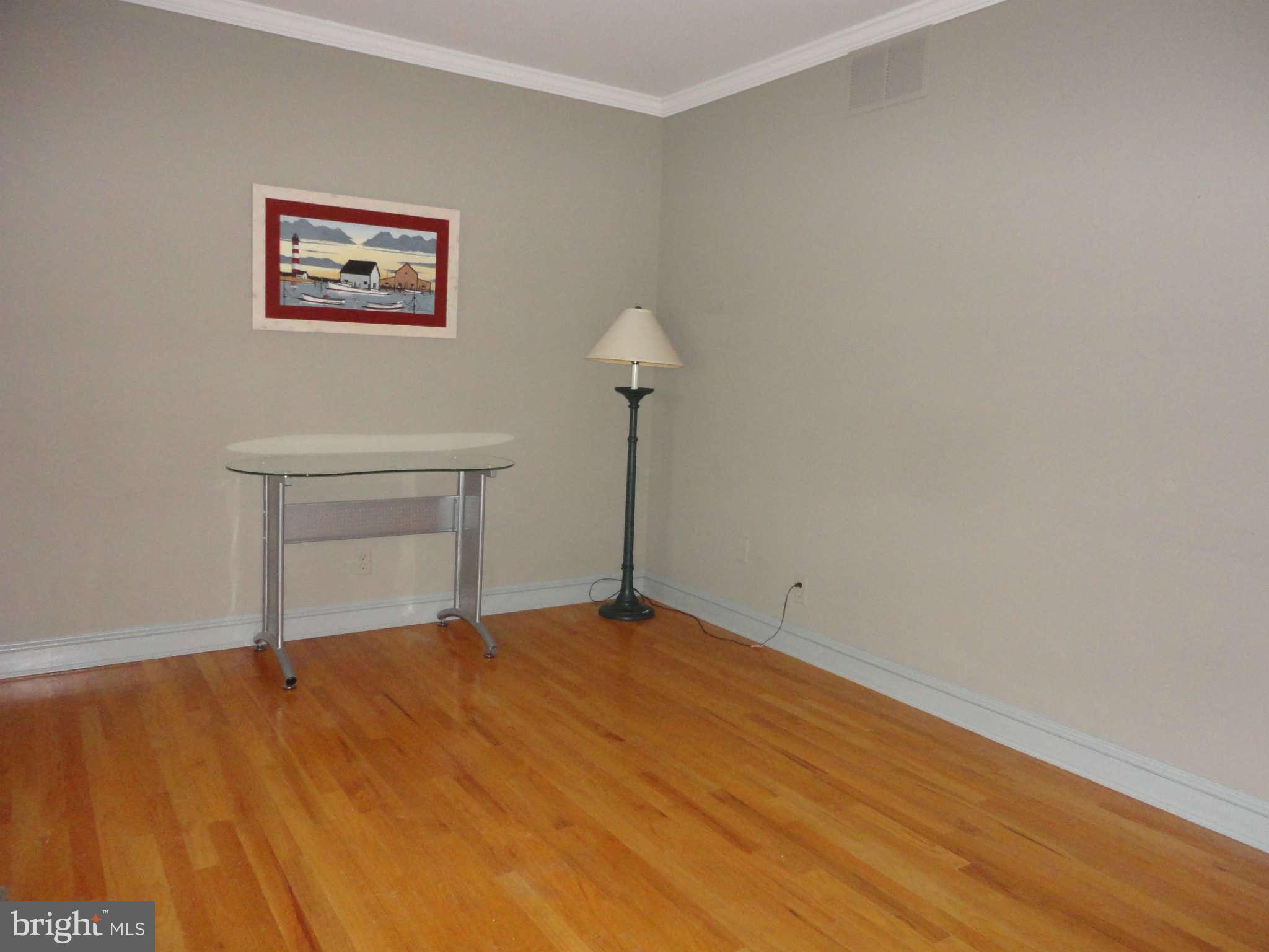 12915 Gent Road Reisterstown, MD 21136 - Photo 21 of 29 a view of empty room with wooden floor