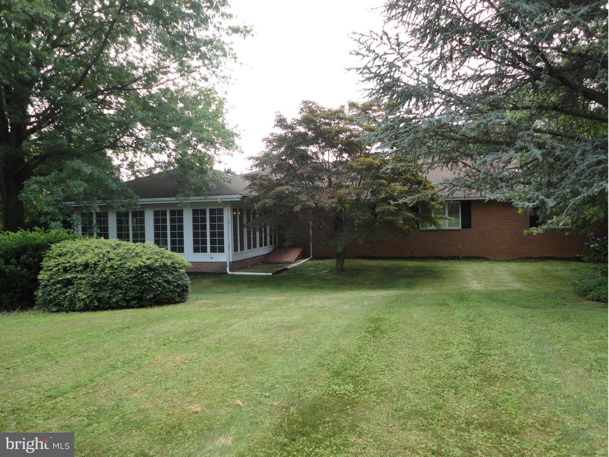 12915 Gent Road Reisterstown, MD 21136 - Photo 29 of 29 a backyard of a house with lots of green space