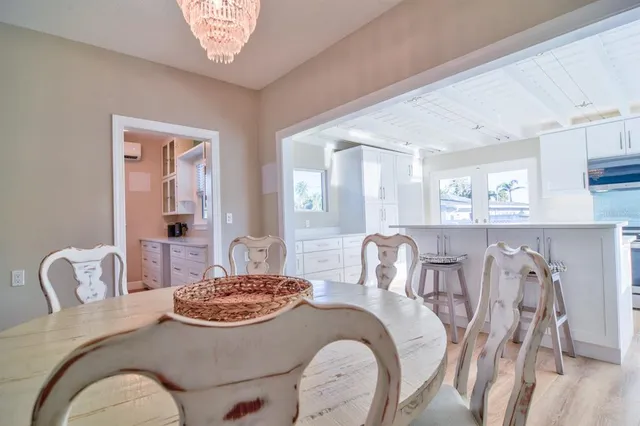 a kitchen with cabinets a sink and appliances