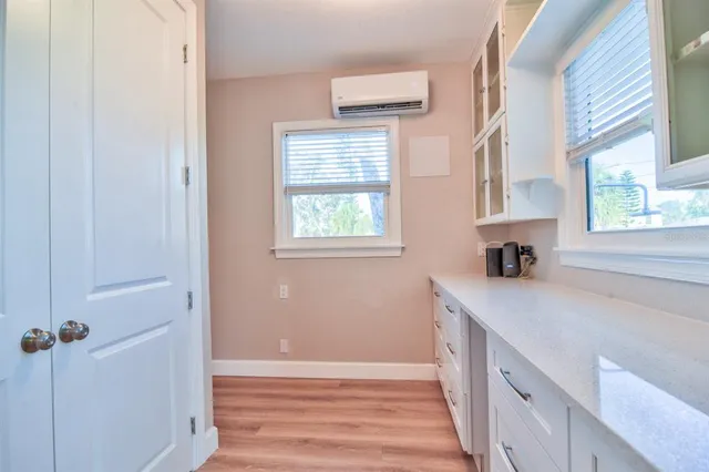 a view of livingroom with furniture and windows