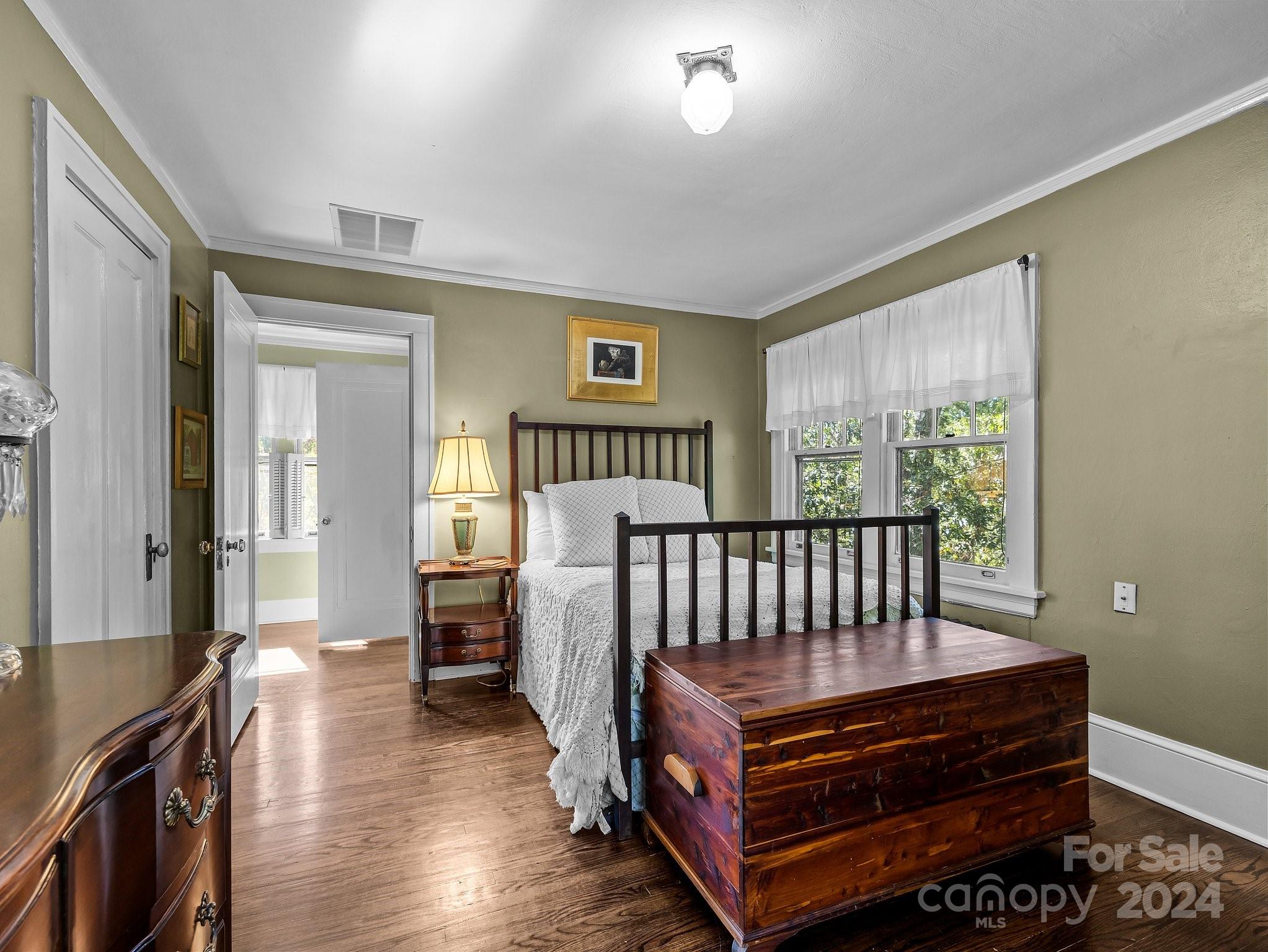 100 Edwin Place Asheville, NC 28801 - Photo 17 of 35 a bedroom with furniture and a window