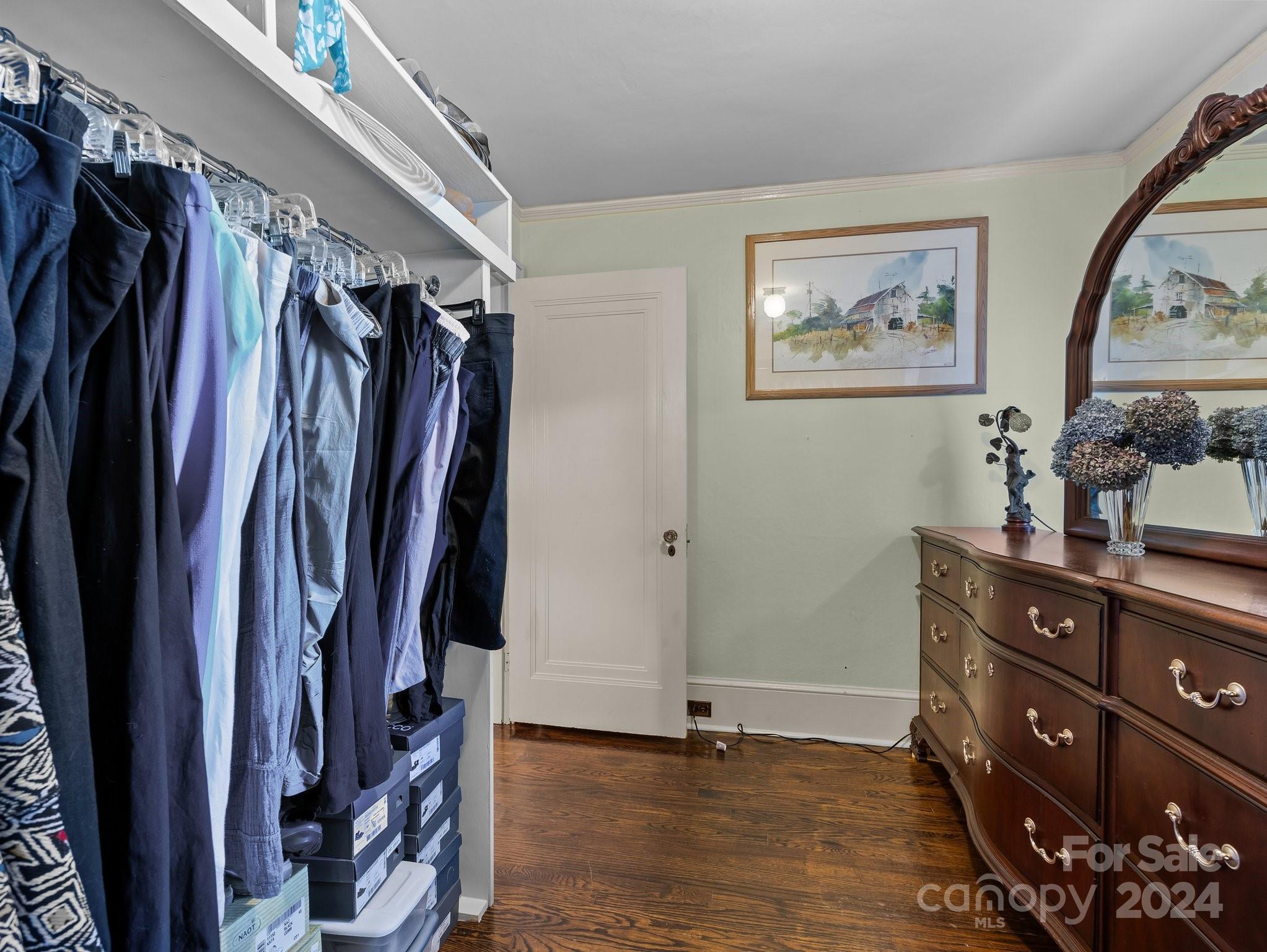 100 Edwin Place Asheville, NC 28801 - Photo 23 of 35 a view of walk in closet with clothes and shoes