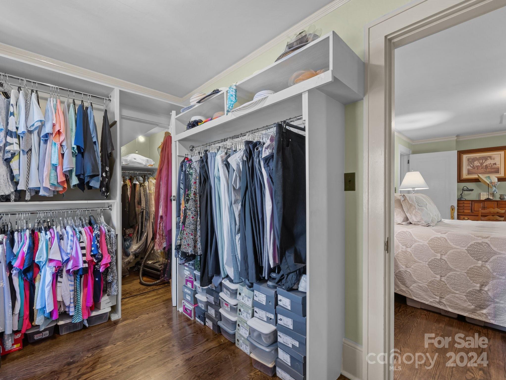 100 Edwin Place Asheville, NC 28801 - Photo 24 of 35 a view of walk in closet with clothes and shoes