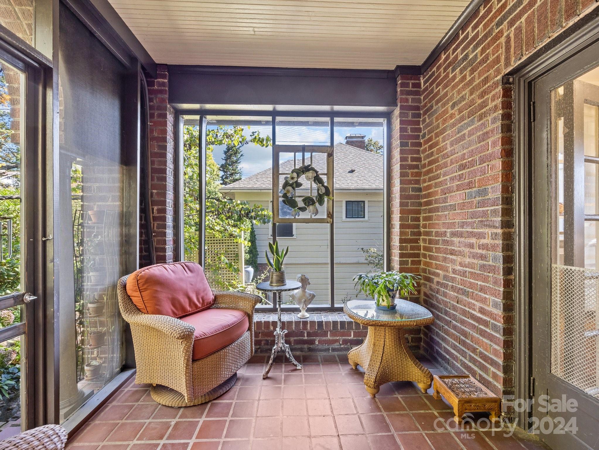 100 Edwin Place Asheville, NC 28801 - Photo 27 of 35 a outdoor space with patio the couches and a potted plant with outer view