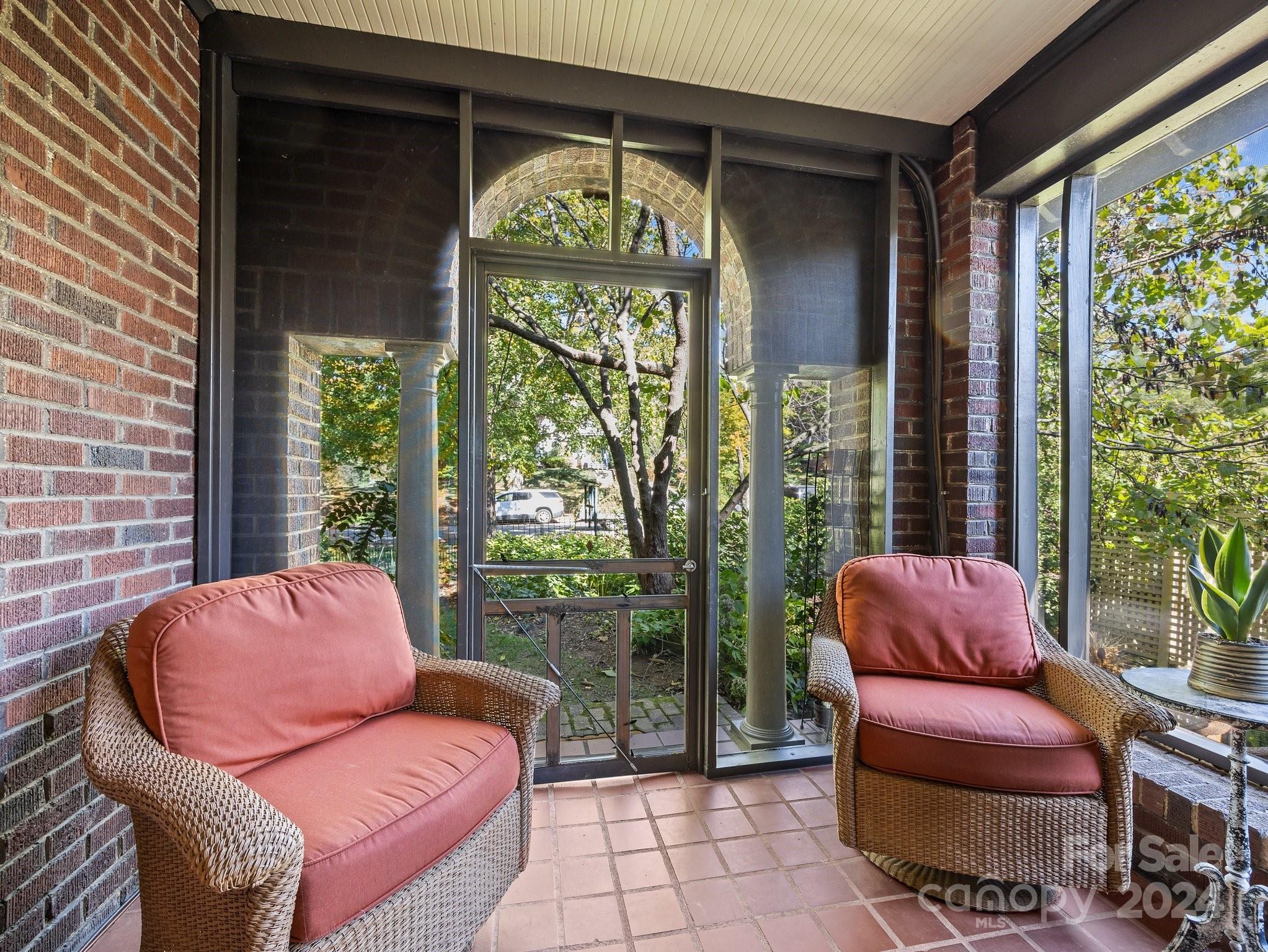 100 Edwin Place Asheville, NC 28801 - Photo 28 of 35 a living room with furniture and a floor to ceiling window