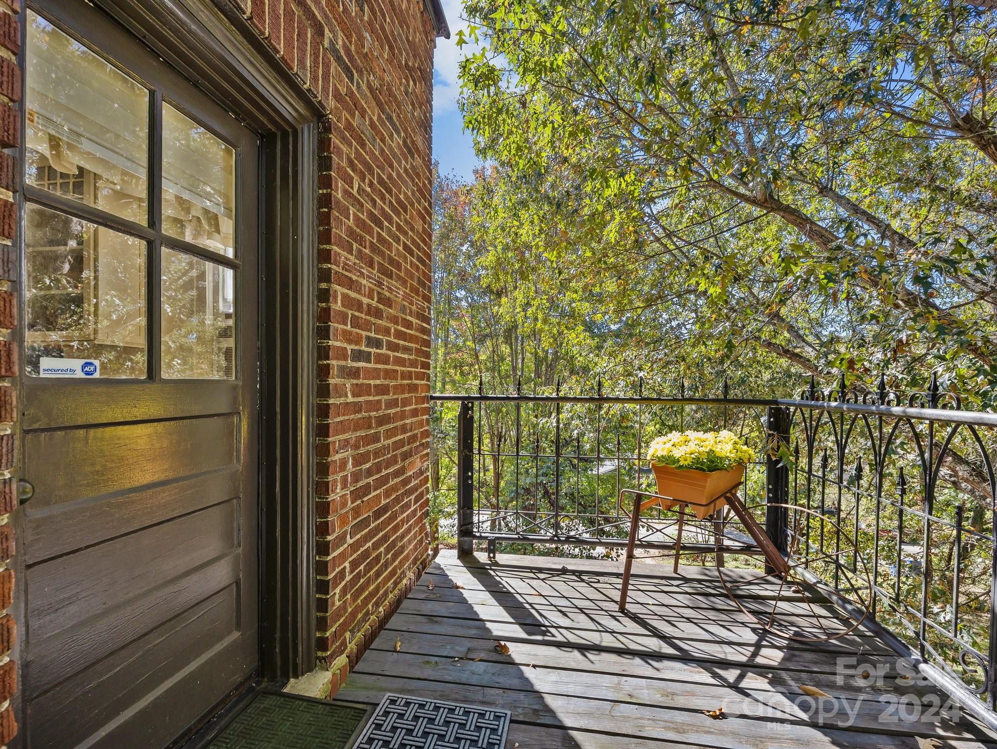 100 Edwin Place Asheville, NC 28801 - Photo 31 of 35 a balcony with wooden floor
