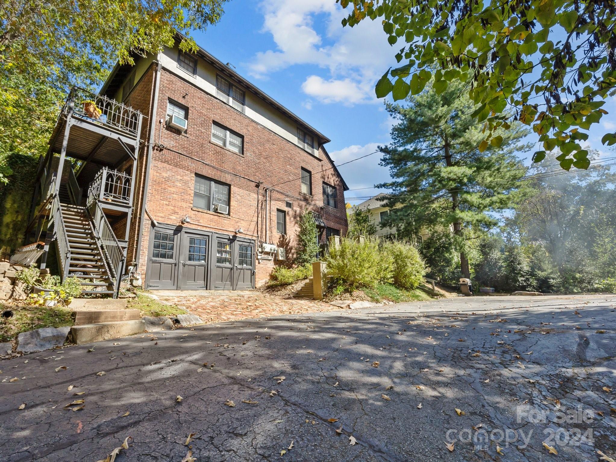 100 Edwin Place Asheville, NC 28801 - Photo 35 of 35 a view of road with yard and trees