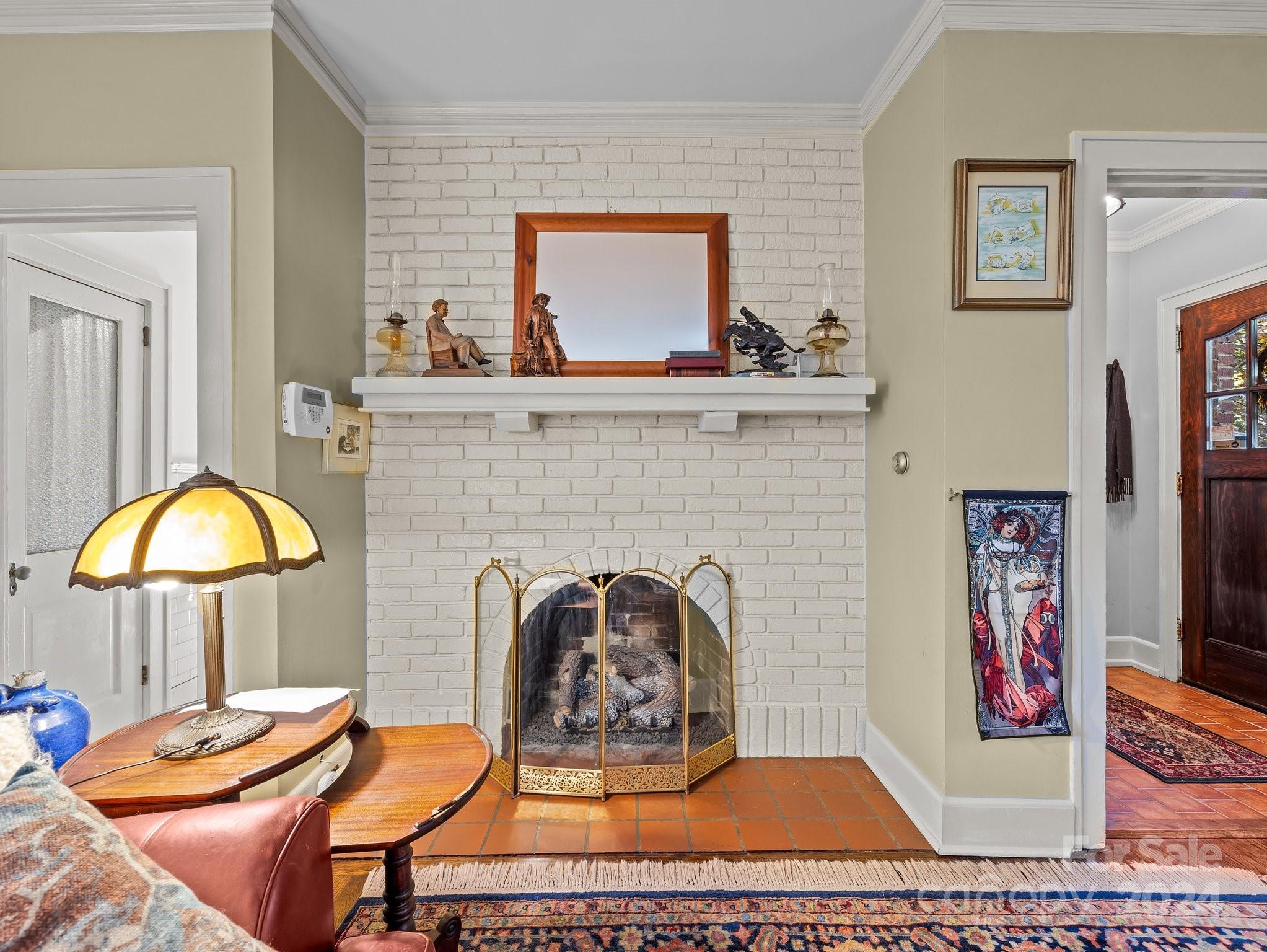 100 Edwin Place Asheville, NC 28801 - Photo 6 of 35 a living room with furniture and a fireplace