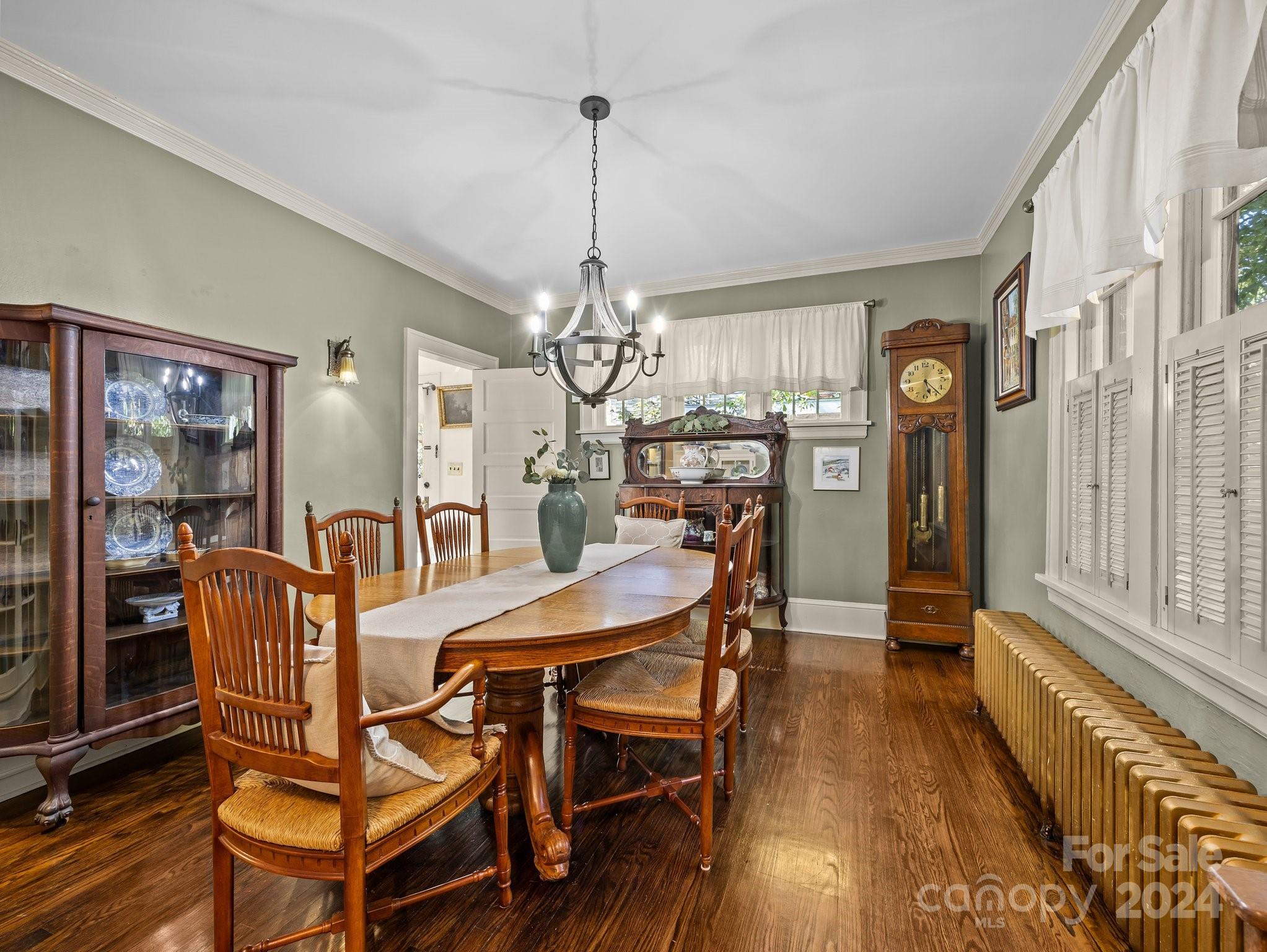 100 Edwin Place Asheville, NC 28801 - Photo 8 of 35 a view of a dining room with furniture window and wooden floor