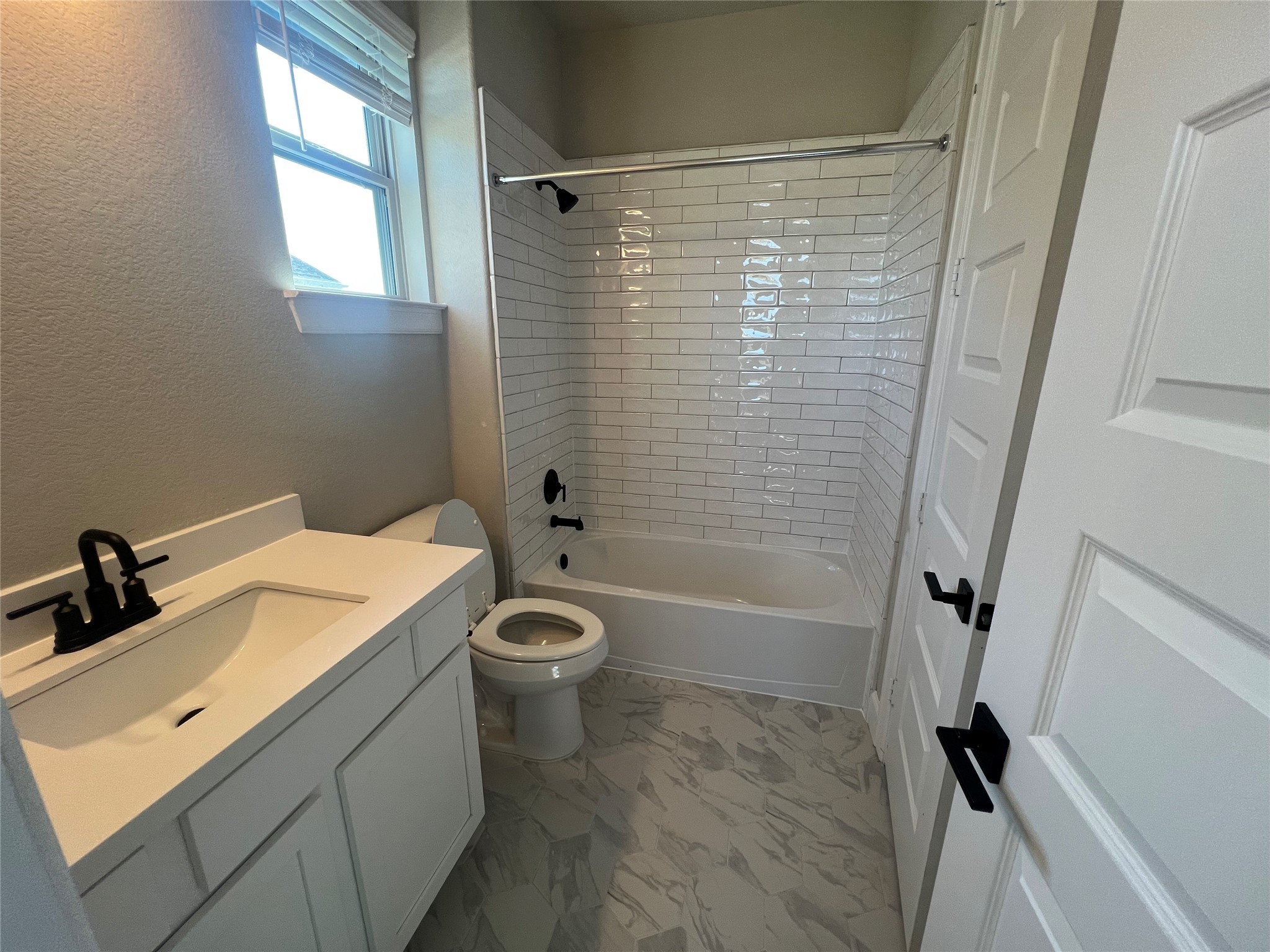 136 Peninsula Point Drive Montgomery, TX 77356 - Photo 12 of 36 a bathroom with a sink a toilet and shower